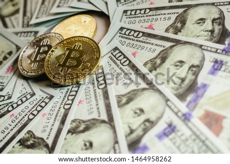 real bitcoins with a value higher than hundreds of dollars in bills.
