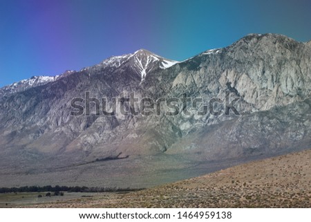 Snow capped Sierra Nevada mountains during the summer time in California
