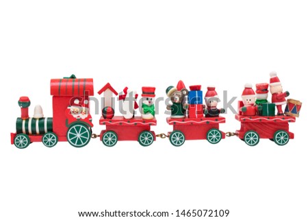 Christmas train toy model carry snowman and gifts isolated on white background.