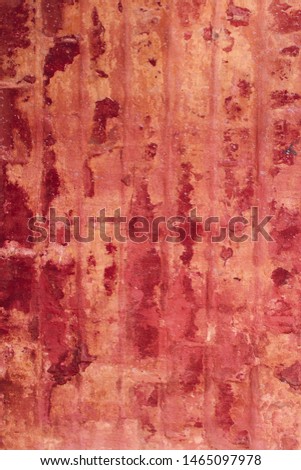 Blurred image of an old painted brick wall texture. Abstract texture background. Old wall background with a lot of copy space for text.