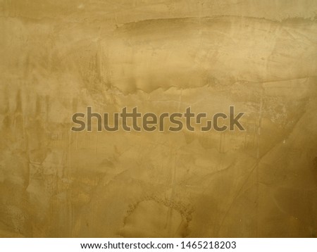 A cement wall with random brush strokes by construction worker.  It's a unique pattern. Background/ textures/ interiors/ copy space concept.