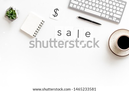 Sale in shop office with word and dollar sign, keyboard, notebook on white background top view mock up