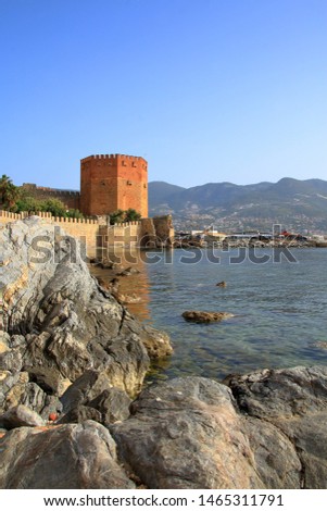 Photo taken in Turkey. The picture shows the red tower in the harbor of Alanya.
