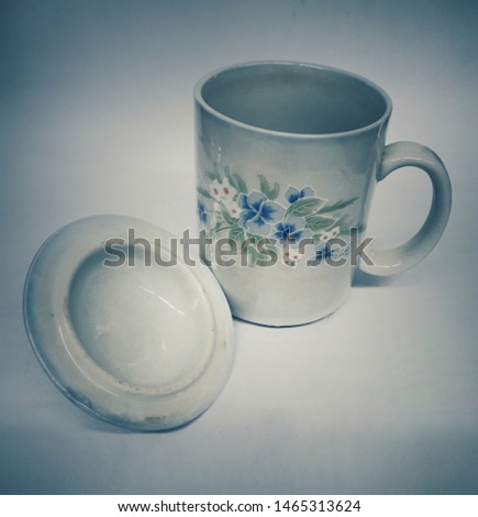 Teacup on vintage decorative pattern