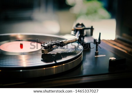 Close-up, vintage record player, While playing the record, Black platter.