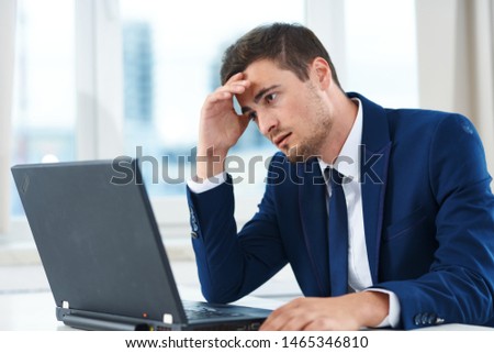 Business man desktop laptop finance headache loan