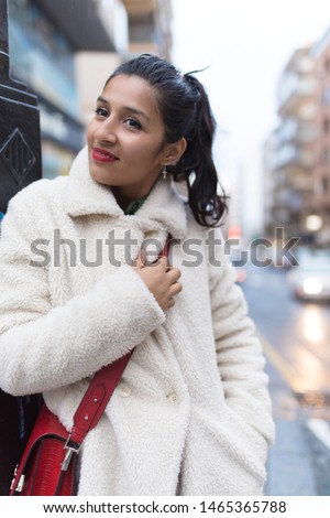 Young indian woman visiting a new city