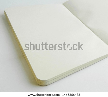Clean open sketchbook with rounded corners. Mockup with paper notebook