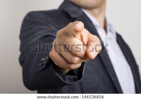 business man points his finger at you Royalty-Free Stock Photo #146536856