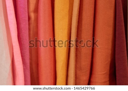 Warm color and fabric swatch samples. colorful background. Colors of textiles.