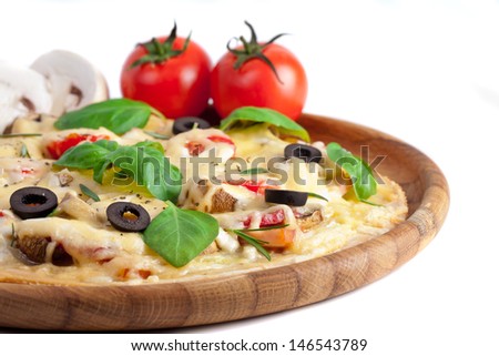 Pizza with ham, salami and olives 