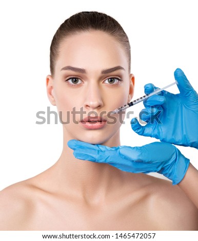 Closeup portrait of beautiful young woman. Beauty procedure.  Beauty treatment Royalty-Free Stock Photo #1465472057