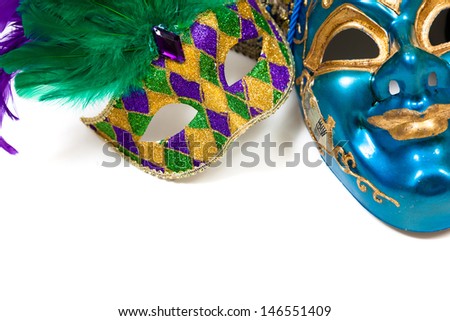 Various colored Mardi gras masks on a white background