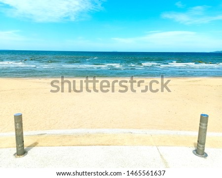 Beautiful beach with white sand and blue sky