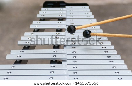 Glockenspiel, also known as orchestra bells, is arranged with metal bars similiar to the keys on a piano, while looking like a xylophone. Royalty-Free Stock Photo #1465575566