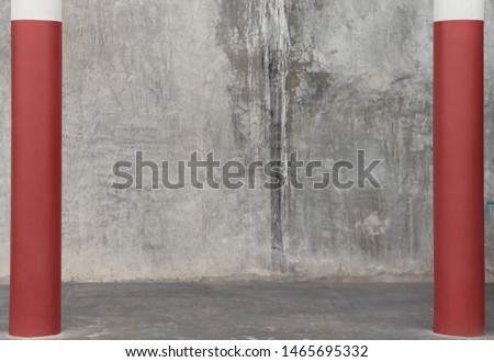Picture of clean and clear rough monotone cement wall with red poles. Copy space for editing and text, Simple and minimal style of wallpaper and backdrop. Photo of background and texture concept.