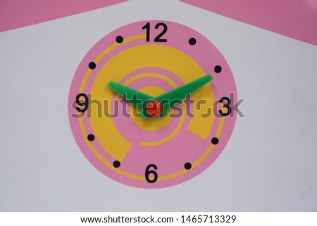 Pink clock toy for kids