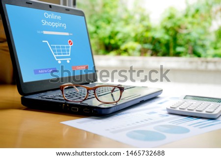 Glasses on laptop Shopping online