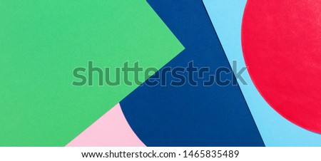 Texture background of fashion papers in memphis geometry style. Blue, green, red and pastel pink colors. Top view, flat lay