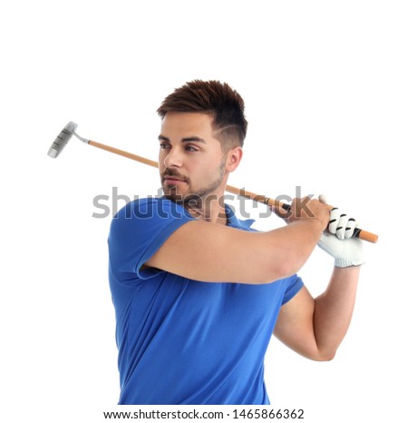 Young man playing golf on white background