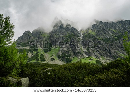 High Tatras mountain range with clouds covering it
