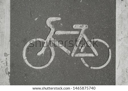 Bike path.. Bike lane sign on a urban road, top view. The concept of health and sports