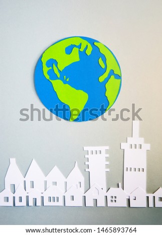 Property all over the world.  Property and house buying concept. Paper cut design background.