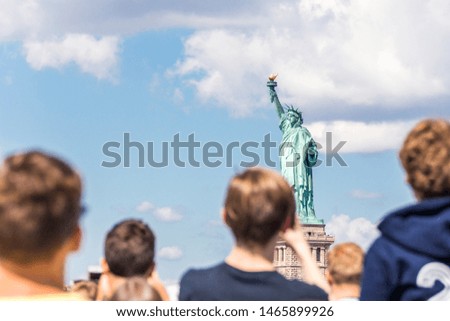 People make photo of the Statue of Liberty, New York City, NY, USA