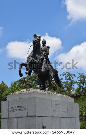 Jackson Square New Orleans Louisiana. Statue of Andrew Jackson on horse with quotation “The Union Must And Shall Be Preserved” and "Major General Andrew Jackson" Blue Sky, Trees, and Clouds Royalty-Free Stock Photo #1465950047