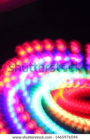 Abstract spinning rainbow colored led lights Royalty-Free Stock Photo #1465976594