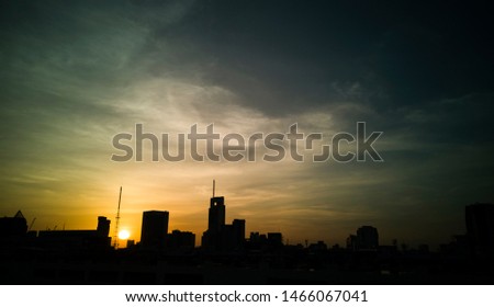 Evening sky sunshine in cities with tall buildings shape 