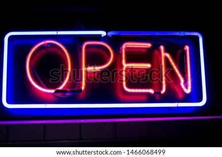 neon open sign in night bar