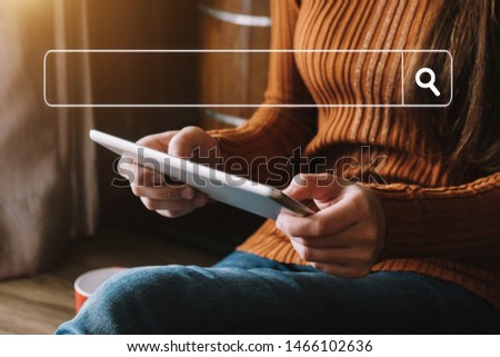 Searching Browsing Internet Data Information with blank search bar.businessman working with smart phone, tablet and laptop computer on desk in office. Networking Concept 