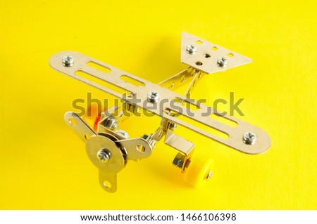 Photo picture of a Small toy metal plane airplane