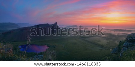 Panoramic landscape on sunrise in Mountain ridge Chests Khakassia Siberia Russia Royalty-Free Stock Photo #1466118335