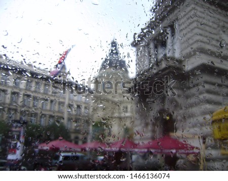 Budapest view through rain drops in autumn. Close up. Texture and backgrounds. Stay at home during quarantine. Save lives