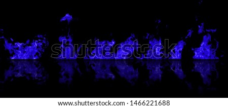 Real fire flames of blue color with reflection isolated on black background. Mockup of 5 flames.