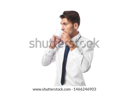 business man drinking coffee over isolated background