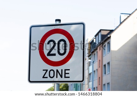 Road signs permission, prohibiting and warning. Here it is allowed to drive no more than twenty kilometers per hour.