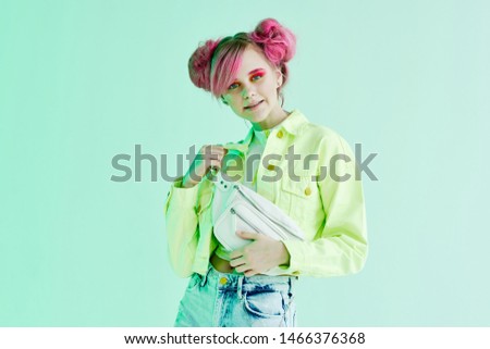 stylish young woman with pink hair