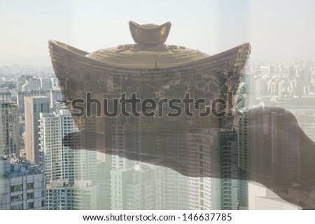 Holding Chinese New Year Gold Ingot, Day City View