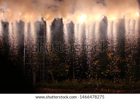 Blurred light, bokeh, fireworks and fireworks at night in celebrations