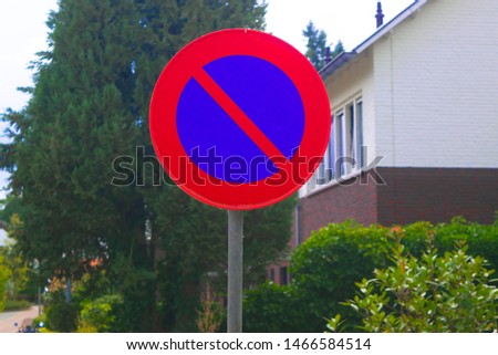 Dutch road sign: no parking on this side of the street