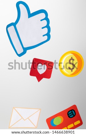 paper icons with envelope, coin, credit card, hearts and thumb up on white background