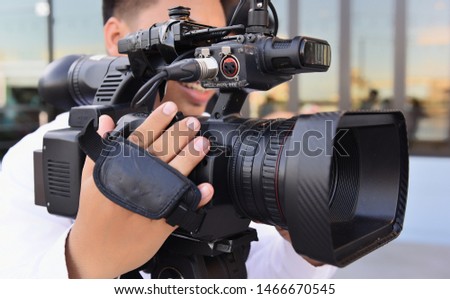 Camera operators working with video 