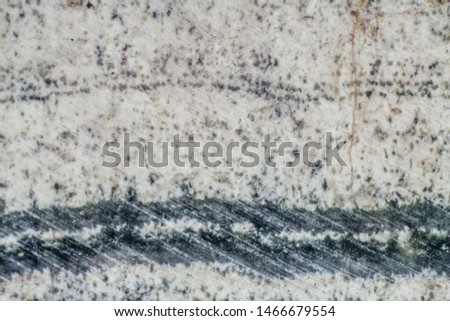Close up texture of the saw cut the skarn with traces of polishing
