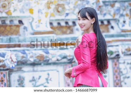 Beautiful Lao girl tourists visiting Thai temples,Bangkok,Thailand.

