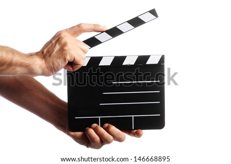 Two hands holding a cinema clap isolated on white