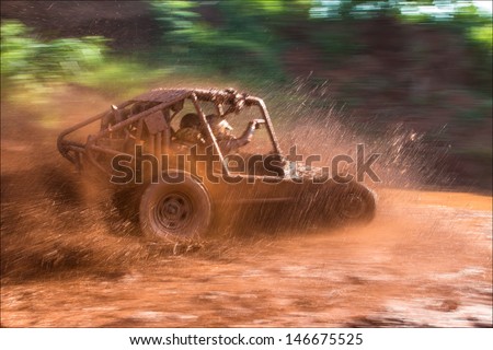 Panoramic scene of mud splash in off-road racing Royalty-Free Stock Photo #146675525