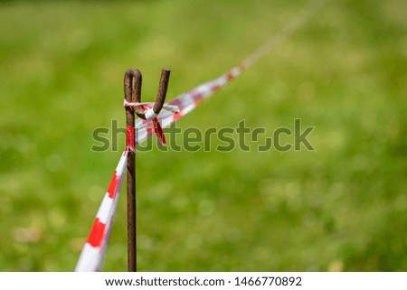 Red and white temporary perimeter tape